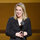 Image for article titled Elizabeth Holmes Has a Husky Named Balto and Tells Everyone He Is a Wolf